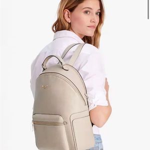 Kate Spade pebbled leather large backpack. NEVER USED. Tag attached. dustbag